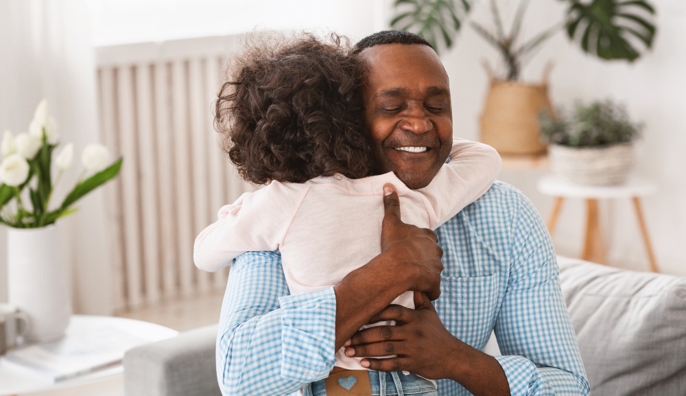 man hugging a child